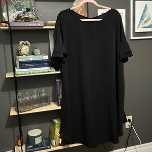 Plus size solid flounce-sleeve dress.